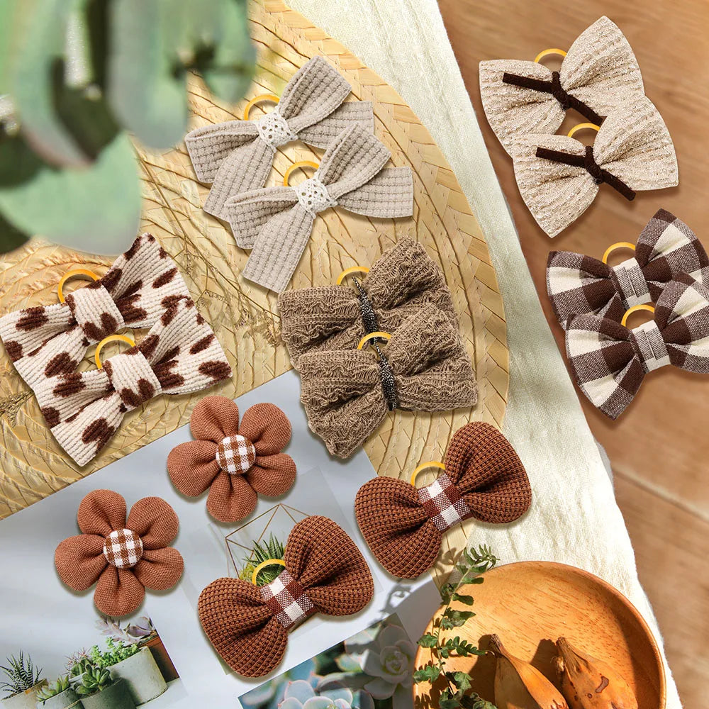 10PCS Archi per capelli per cani Elastici per animali domestici Cane di piccola taglia Gatto Bowknot Cani carini Archi per cani Toelettatura Accessori per animali domestici per cani di piccola taglia
